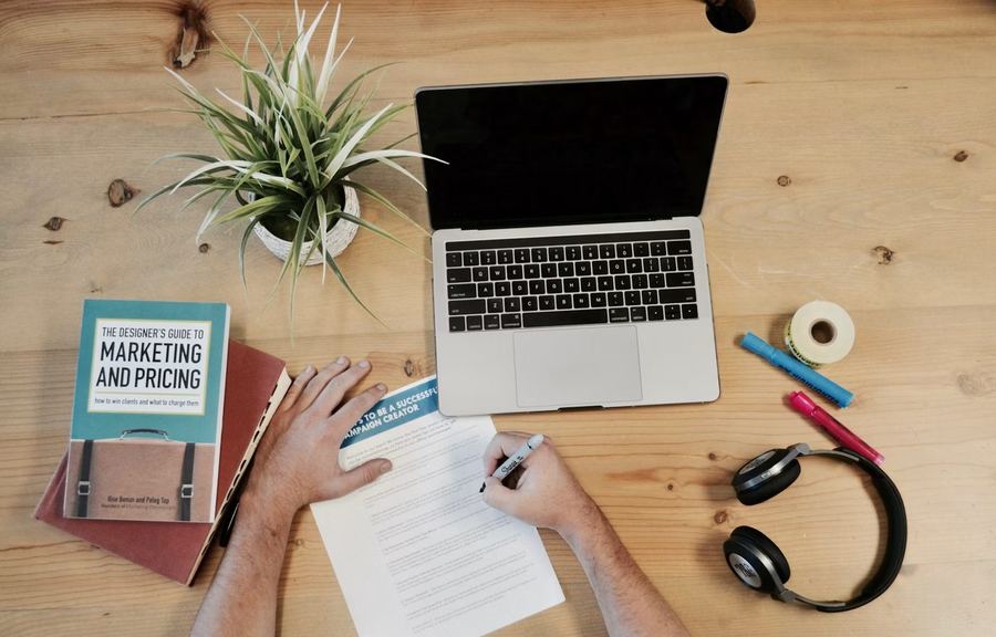 Small business owner reviewing website design and SEO strategy